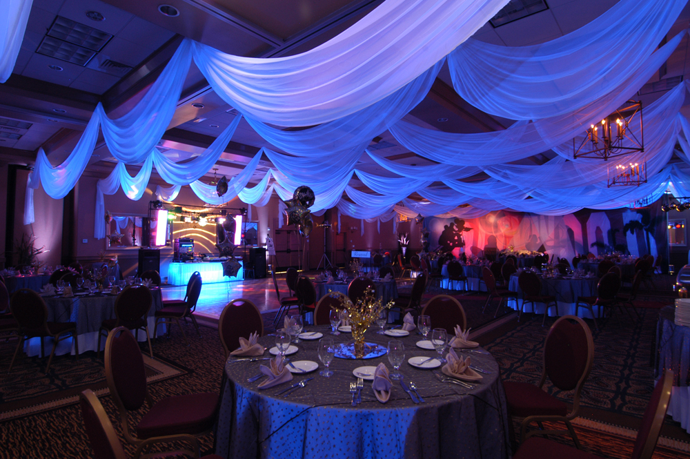 White chiffon ceiling treatments made to size by W Drapings for a birthday celebration. Photo by Concept Photography.