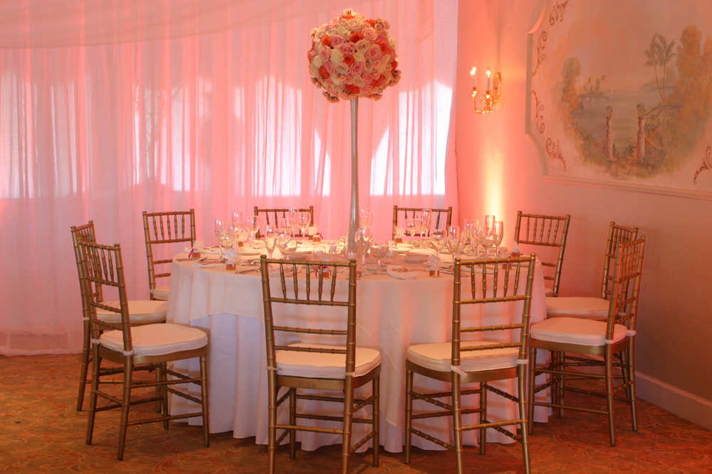 Classic pipe and drape in white chiffon by W Drapings for an intimate wedding reception in Central Florida. Photo by Concept Photography.