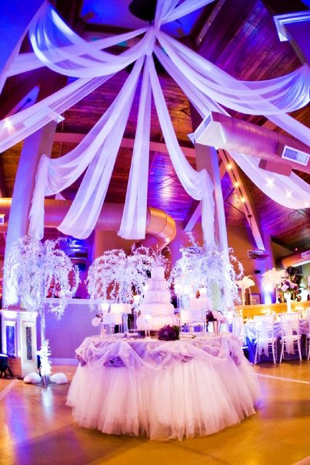 Custom ceiling treatment in white chiffon by W Drapings. Photo by Concept Photography.